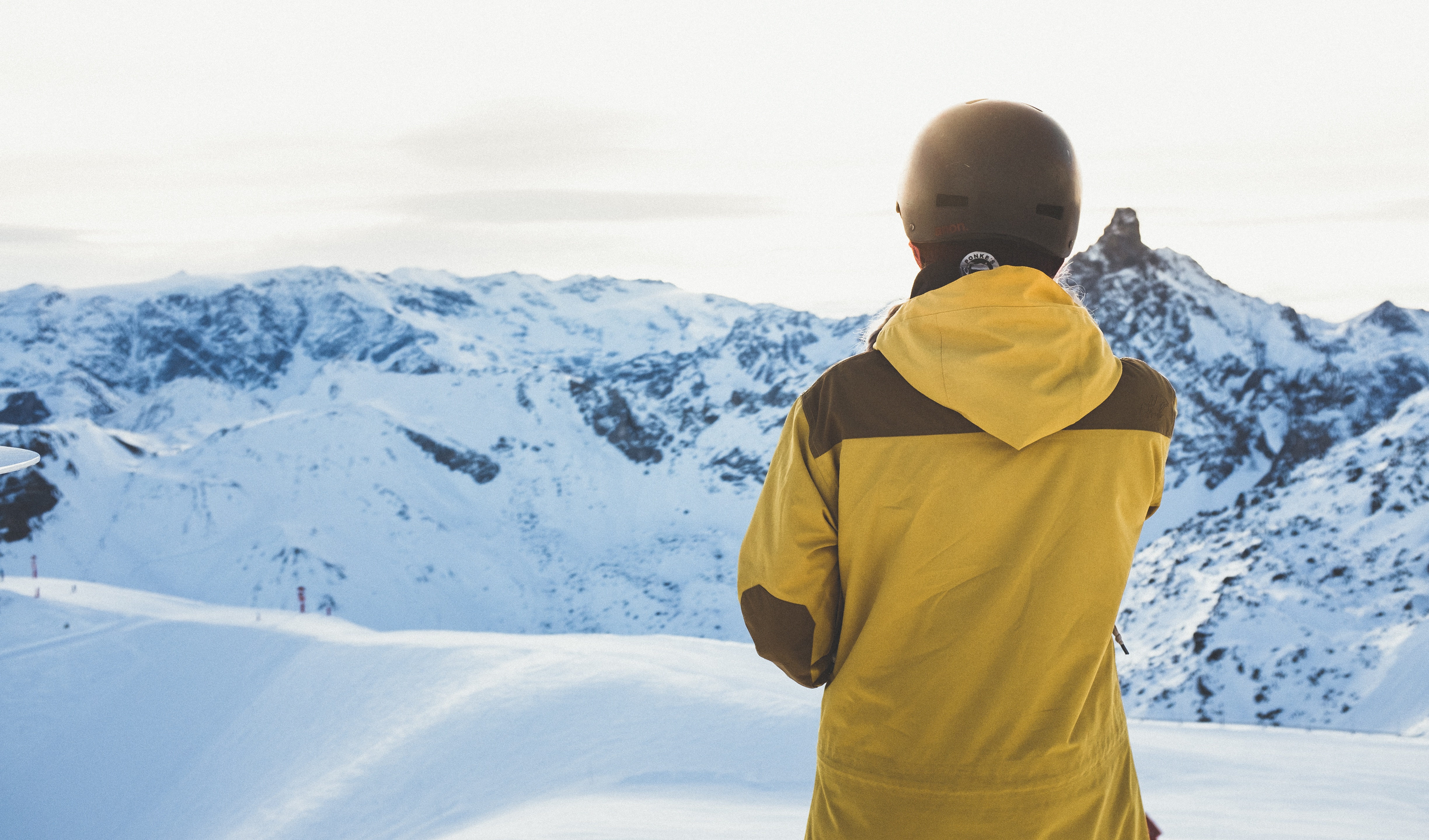 skiier looking at mountain